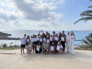 Participants celebrating with certificates at the end of the Citizens of Tomorrow youth exchange in Paphos