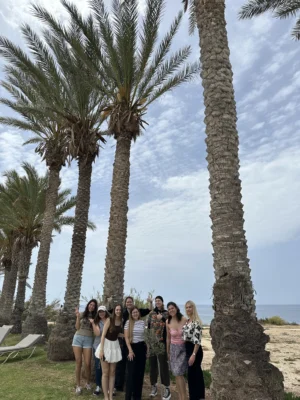 Participants from five countries posing during the Citizens of Tomorrow youth exchange by the seaside in Paphos