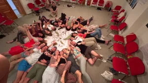 Participants holding their certificates during the final group photo of the A Journey to Well-Being Erasmus+ training course in Paphos.