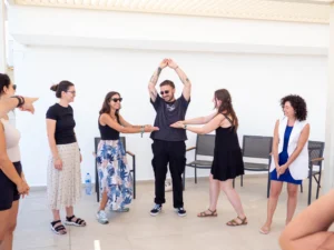 Youth workers participating in an outdoor non-formal learning activity during the YETF photography training course in Paphos.